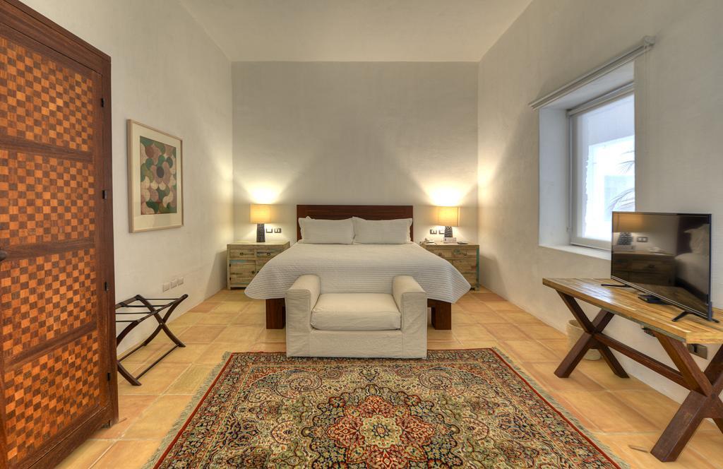 Hotel Boutique Casareyna Puebla Exterior foto A bedroom at the hotel